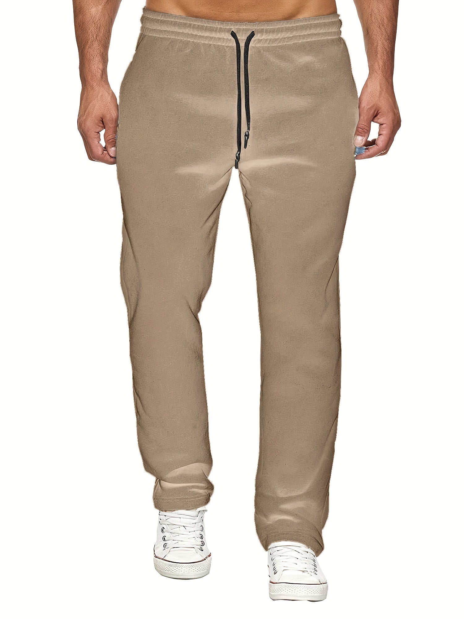 Stay comfy and warm in these men's solid color fleece-lined joggers! -
