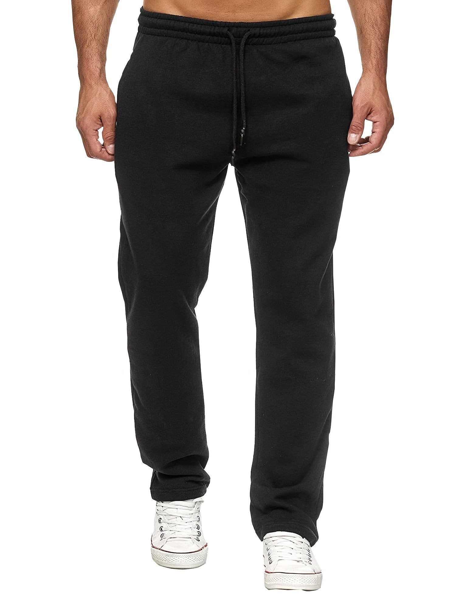 Stay comfy and warm in these men's solid color fleece-lined joggers! -