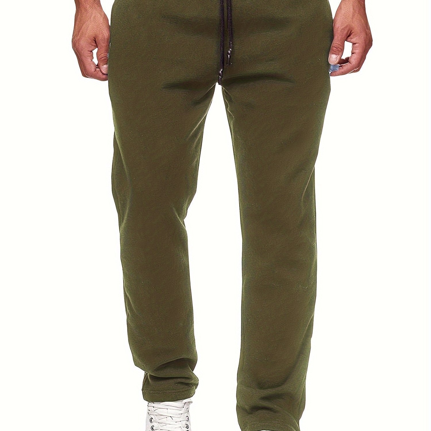 Stay comfy and warm in these men's solid color fleece-lined joggers! -
