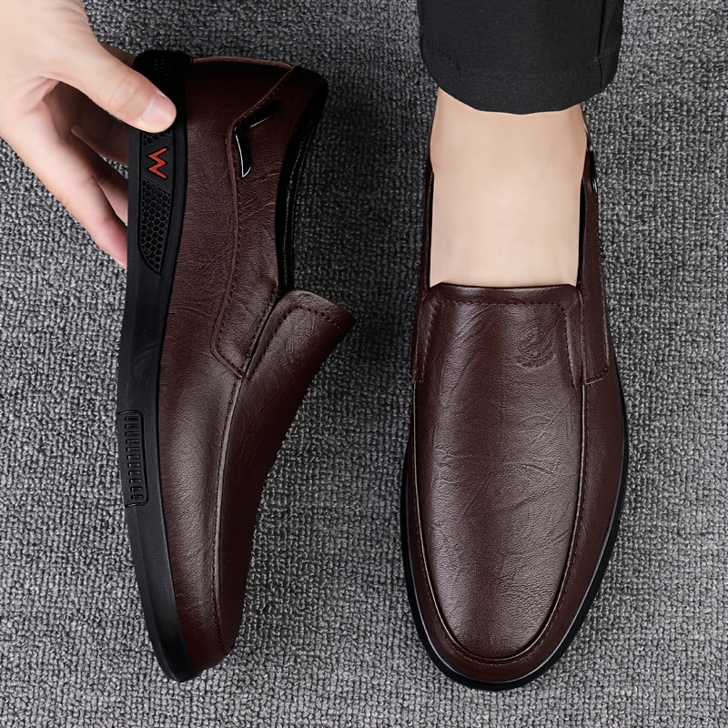 Step into comfort and safety with these men's genuine leather slip-on, slip-resistant shoes! -