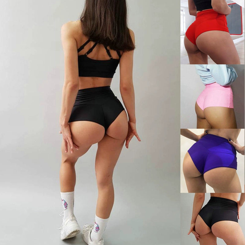 Elevate your workout wardrobe with these solid color high-waisted yoga shorts, designed for a flattering fit and maximum comfort during exercise sessions! -