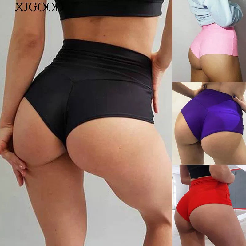 Elevate your workout wardrobe with these solid color high-waisted yoga shorts, designed for a flattering fit and maximum comfort during exercise sessions! -