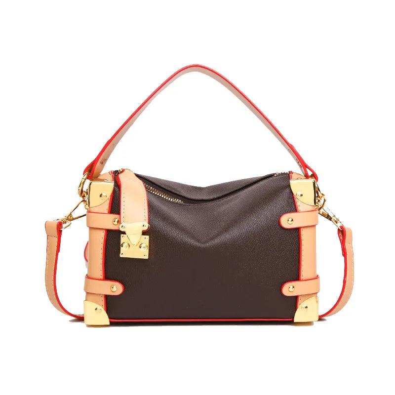 Make a statement with this luxurious and elegant box bag for women. Crafted from high-quality leather, this shoulder handbag features an elegant top-handle design, exuding sophistication and style for a classy finishing touch to your ensemble. -