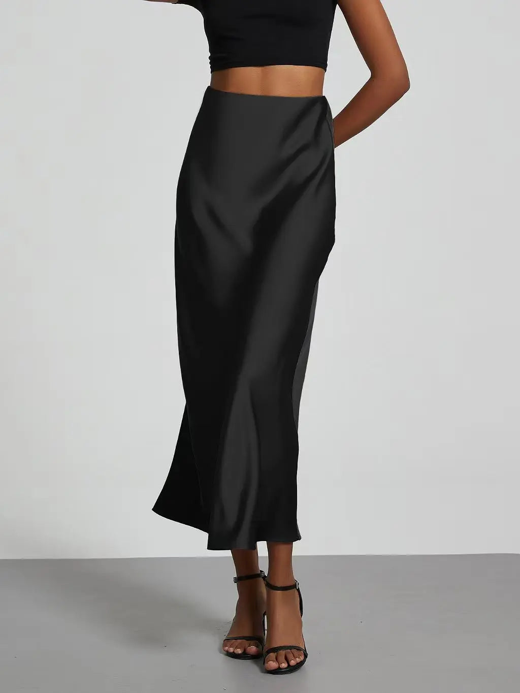 Elevate your elegance with this sleek black satin skirt for women—perfect for any occasion! -
