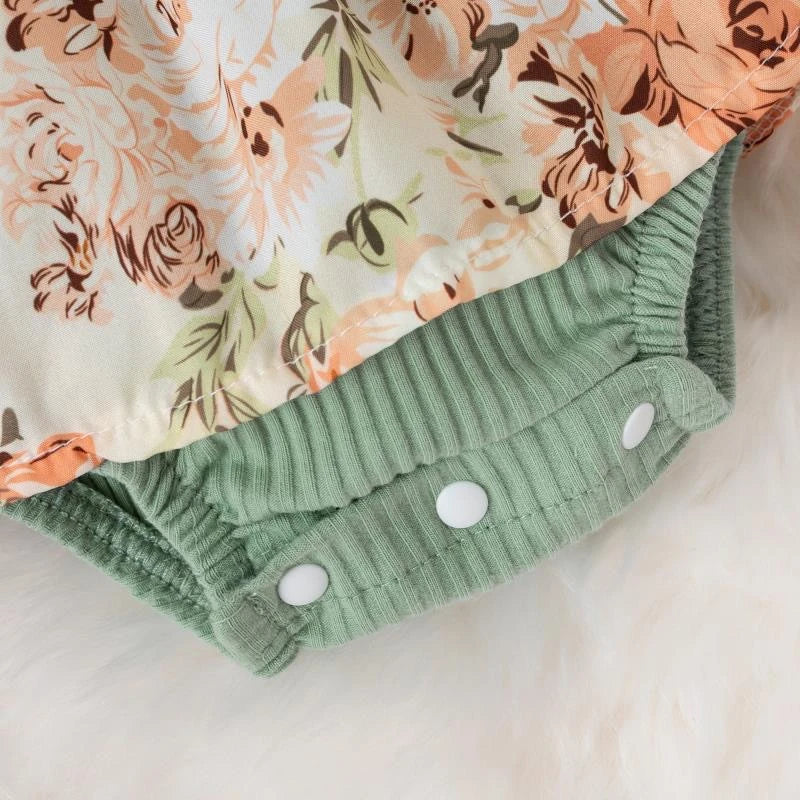Dress your baby girl in adorable comfort with this striped cotton jumpsuit featuring a sweet bowknot—perfect for newborns! -