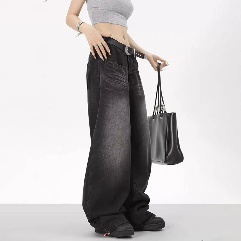 Rock a vintage vibe with these oversized retro black wide-leg jeans for women! -