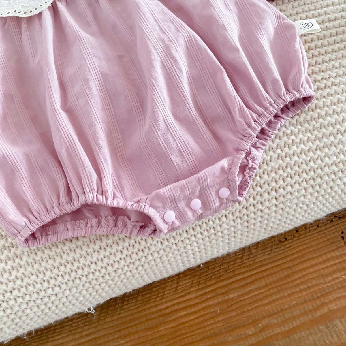 Dress your newborn in adorable style with this fashionable lace baby romper bodysuit—soft, comfy, and perfect for special moments! -