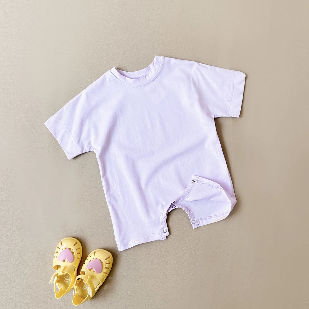 Keep your baby boy comfy and cute with this basic romper, perfect for ages 0-1 year! -