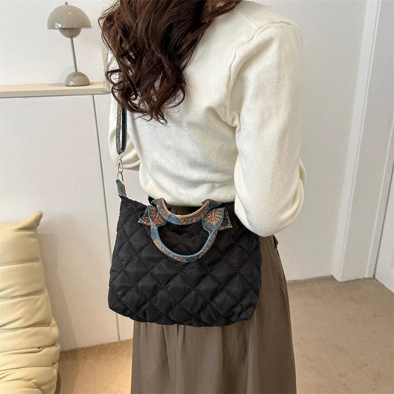 Elevate your style with these luxury designer shoulder crossbody bags for women. Featuring a quilted padded design from a top designer brand, these handbags are perfect for adding a touch of elegance to any outfit. -