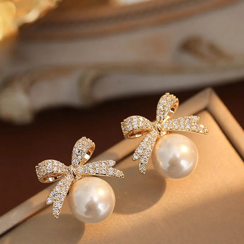 Sparkling Rhinestone Bow Pearl Stud Earrings -
