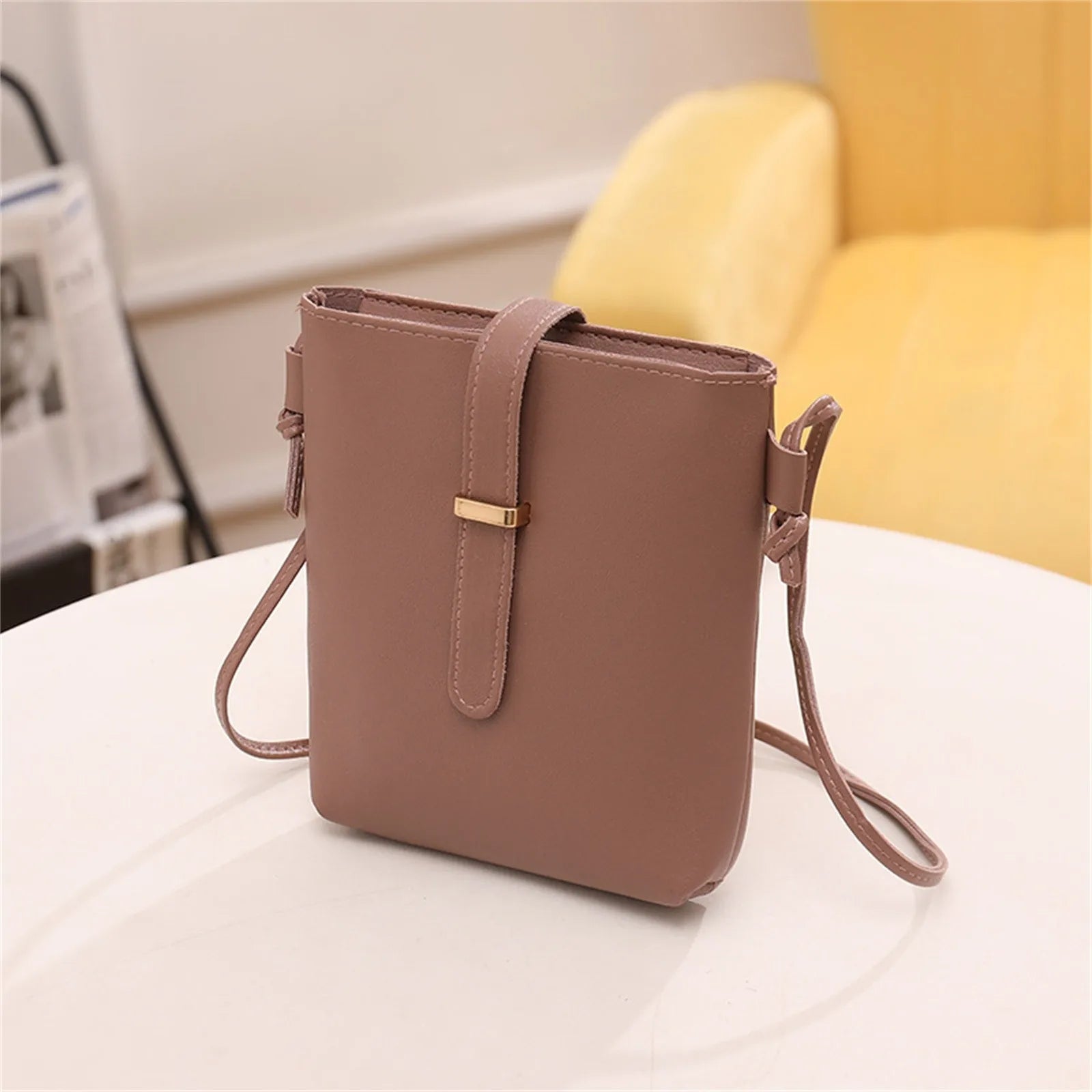 Stay on trend with this fashionable drawstring lady bag, featuring a stylish cross-border design and casual letter detail. Perfect for adding a chic and trendy touch to your outfit! -