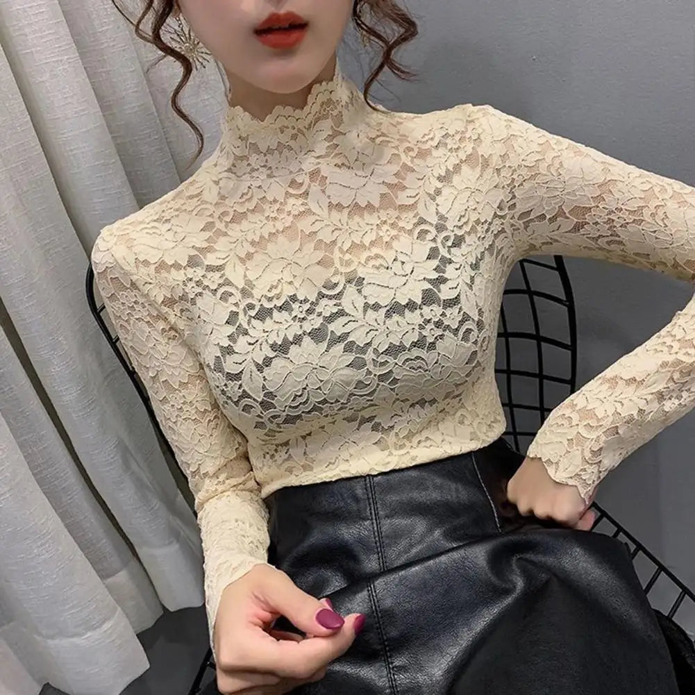 Achieve an elegant and feminine look with this long sleeve lace crochet top. The see-through design adds a touch of allure and sophistication to your outfit. -