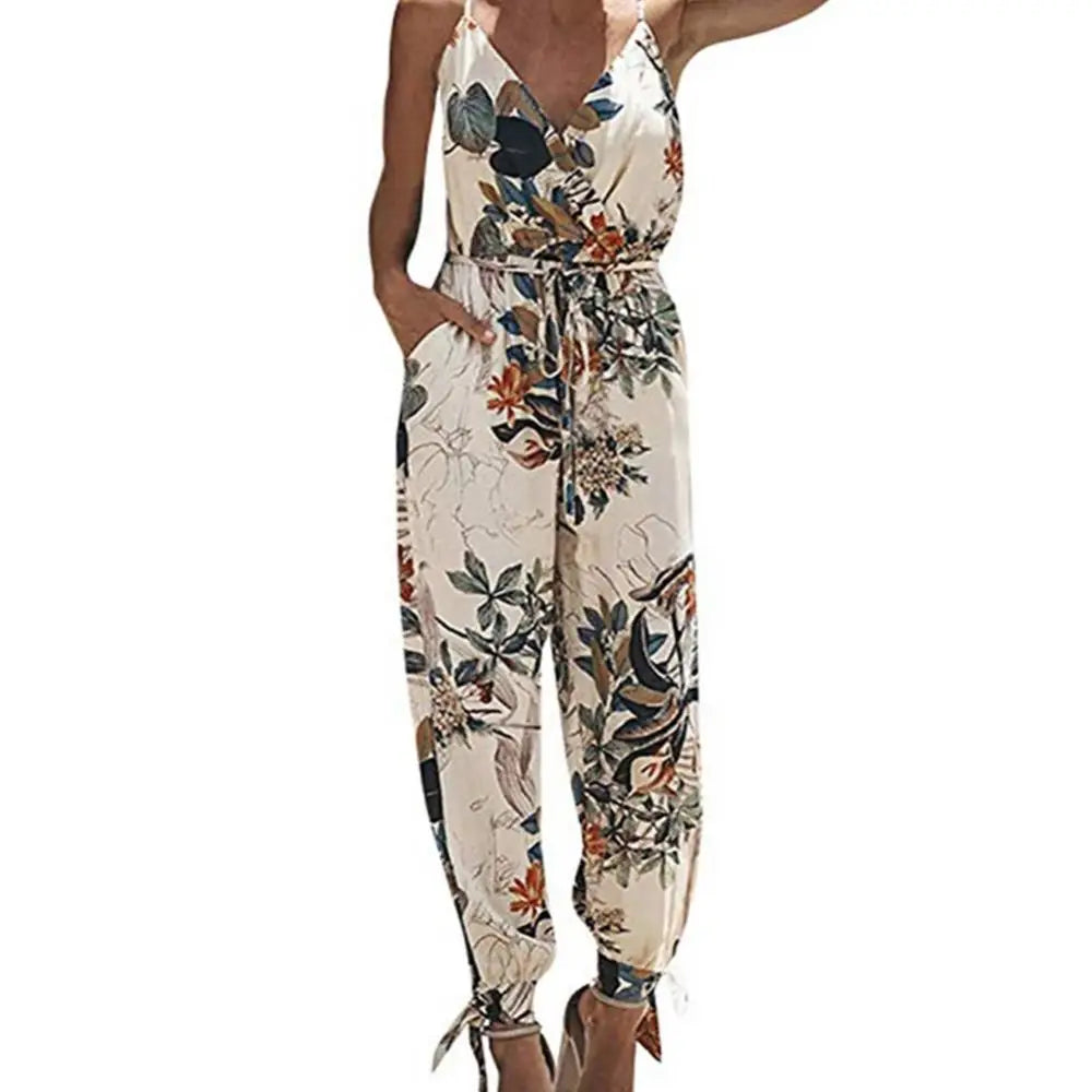 Dress to impress in this sexy and stylish women's summer jumpsuit. Featuring a backless design, deep V-neckline, floral print, and strappy details, this romper is perfect for making a statement with your outfit! -
