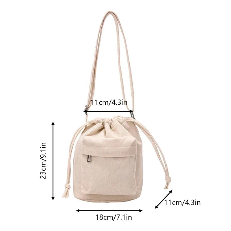 Carry your essentials in style with this cute middle shoulder drawstring bucket bag—a versatile and fashionable accessory for women on the go! -
