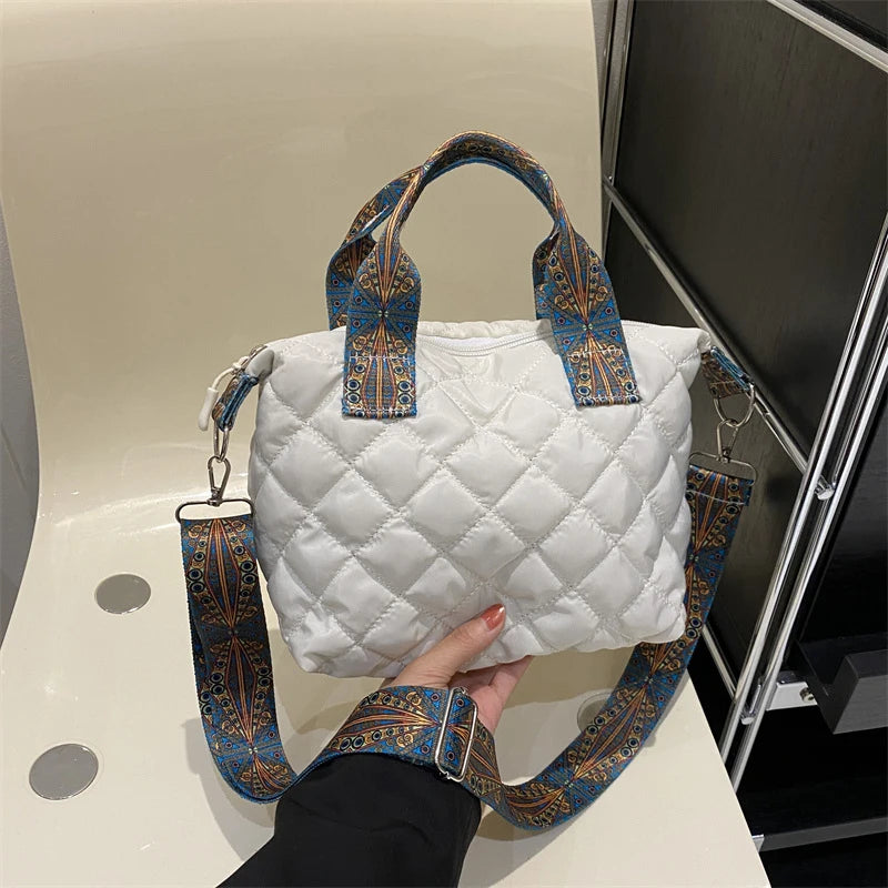 Elevate your style with these luxury designer shoulder crossbody bags for women. Featuring a quilted padded design from a top designer brand, these handbags are perfect for adding a touch of elegance to any outfit. -