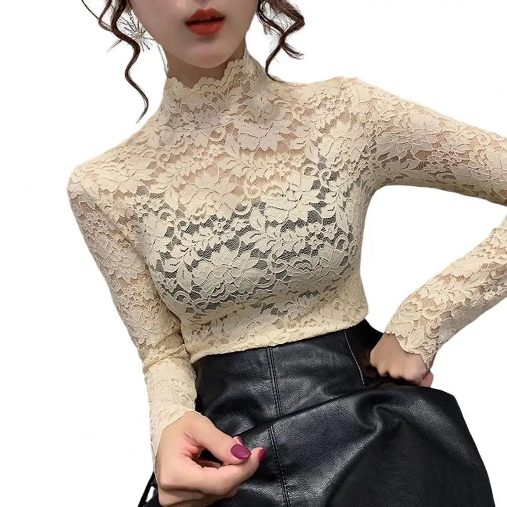 Achieve an elegant and feminine look with this long sleeve lace crochet top. The see-through design adds a touch of allure and sophistication to your outfit. -