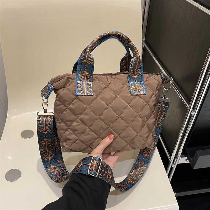 Elevate your style with these luxury designer shoulder crossbody bags for women. Featuring a quilted padded design from a top designer brand, these handbags are perfect for adding a touch of elegance to any outfit. -