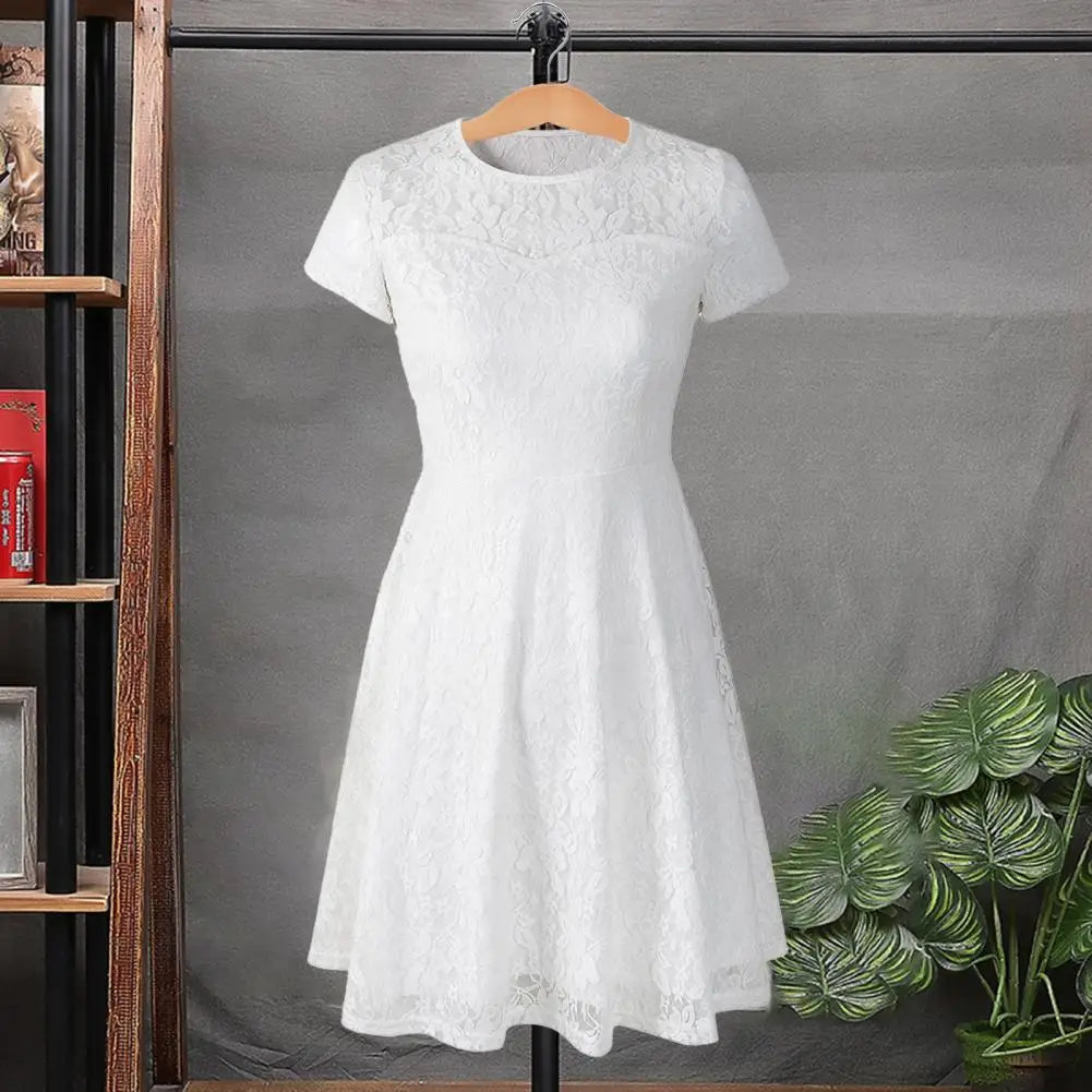 Make a chic statement with this elegant women's dress featuring an O-neck design, transparent lace, and hollow detail—a perfect choice for a sophisticated and stylish look. -