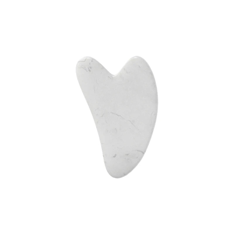 Enhance your skincare routine with this facial roller for the face, neck, and eyes. This resin massage tool can help improve circulation, reduce puffiness, and promote relaxation for a revitalized complexion. -