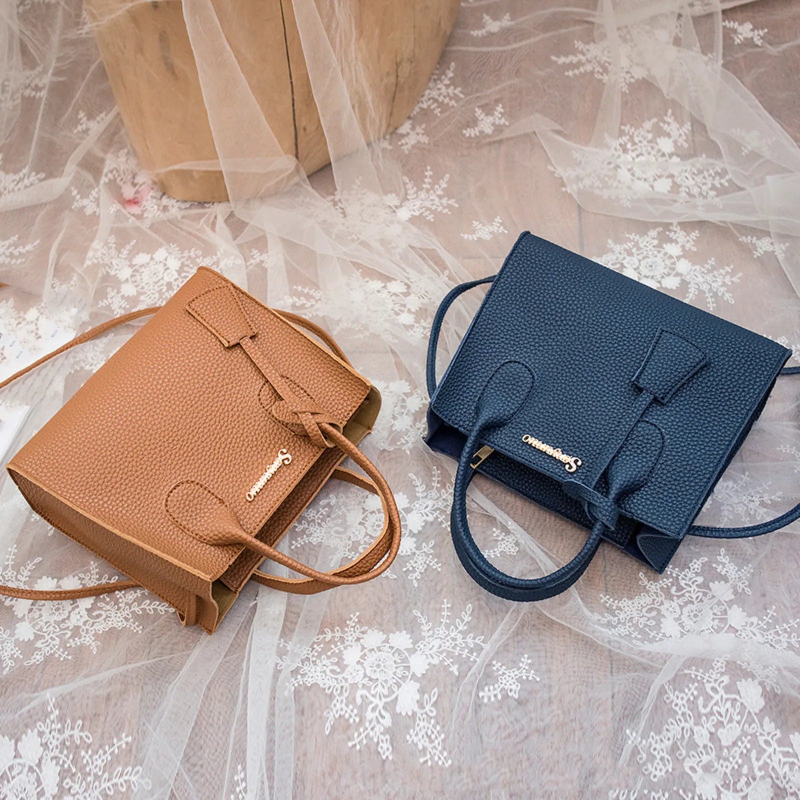Carry your essentials in style with this versatile women's tote bag. Featuring a large capacity and made from casual PU leather, this crossbody handbag is perfect for adding a fashionable touch to your everyday look. -