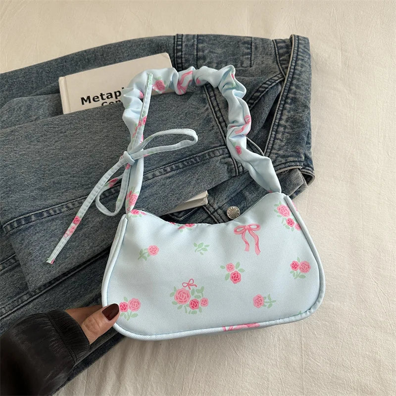 Stay stylish with these chic women's handbags made from nylon. Featuring a pleated design, these bags are perfect for the summer season, offering a trendy and functional accessory for your everyday outfits. -
