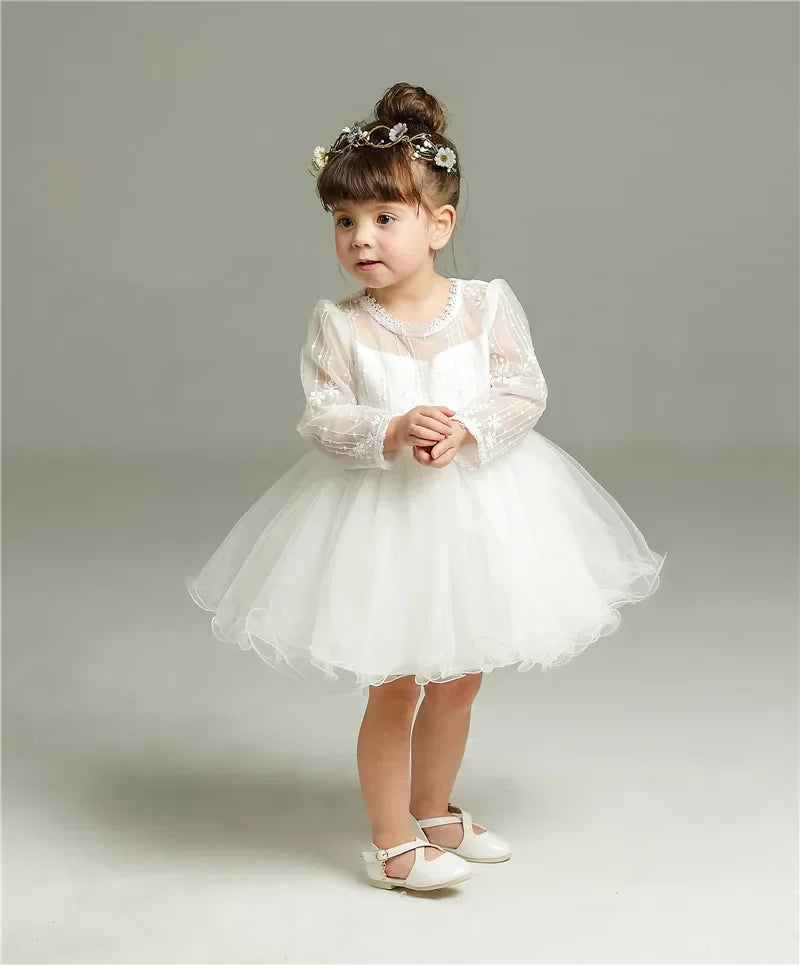 Make your baby girl shine in this elegant long-sleeve white party dress—perfect for special occasions! -