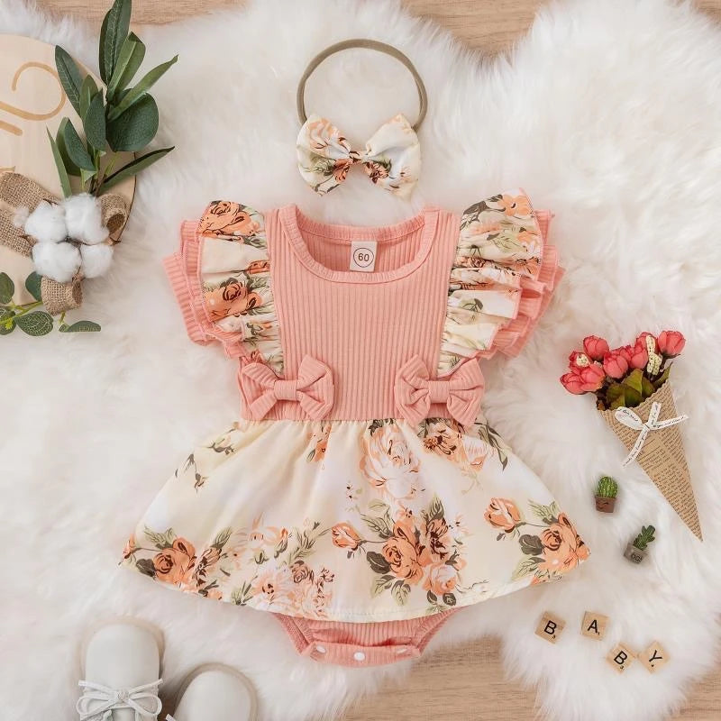 Dress your baby girl in adorable comfort with this striped cotton jumpsuit featuring a sweet bowknot—perfect for newborns! -