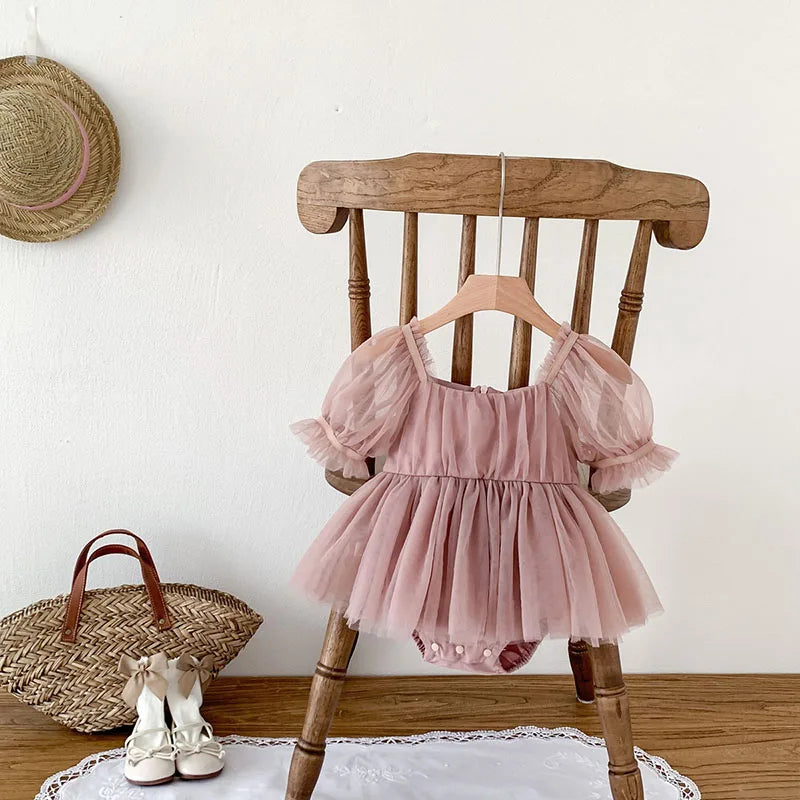 Dress your toddler in sweet style with this new baby lace dress featuring a big bowknot and short sleeves—perfect for special occasions! -