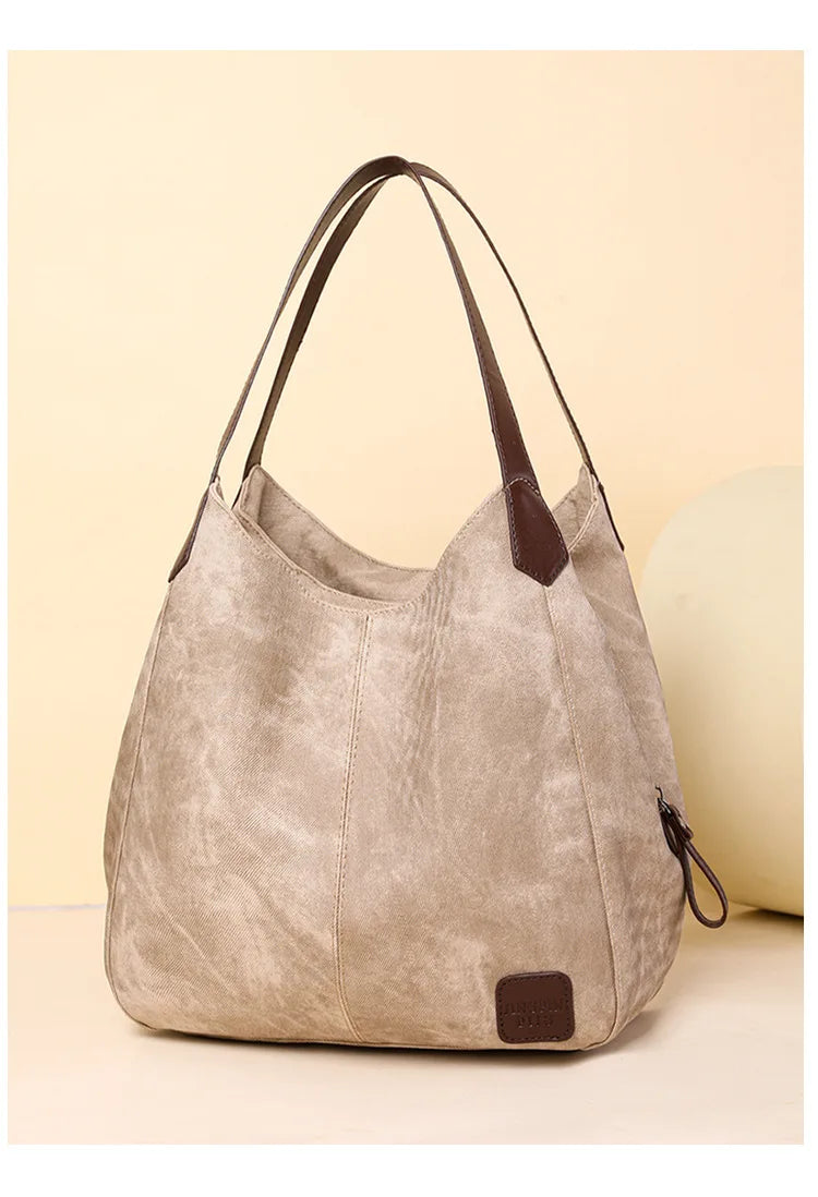 Stay organized and stylish with this large work tote bag for women. Designed with designer PU leather, this big bucket bag is perfect for carrying all your essentials in a chic and fashionable way. -