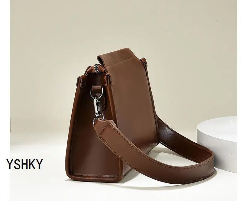 Elevate your style with this luxury designer crossbody bag for women, featuring a fashionable and chic color. Perfect for adding a touch of sophistication to your ensemble! -
