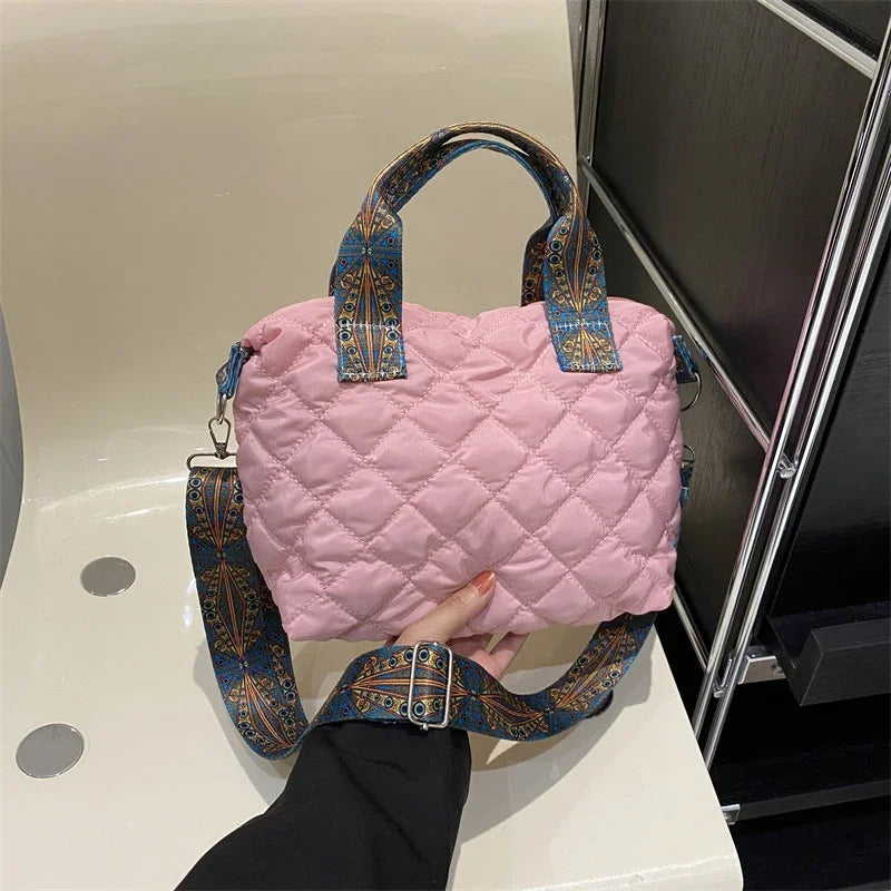 Elevate your style with these luxury designer shoulder crossbody bags for women. Featuring a quilted padded design from a top designer brand, these handbags are perfect for adding a touch of elegance to any outfit. -