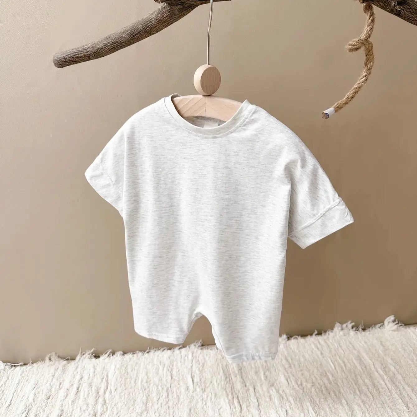 Keep your baby boy comfy and cute with this basic romper, perfect for ages 0-1 year! -