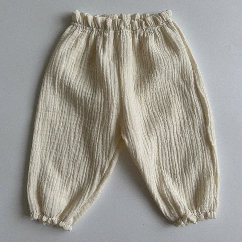 Keep your little ones comfy and cute in these organic cotton loose-fit baby pants—featuring playful tiger, bear, and floral prints perfect for boys and girls! -