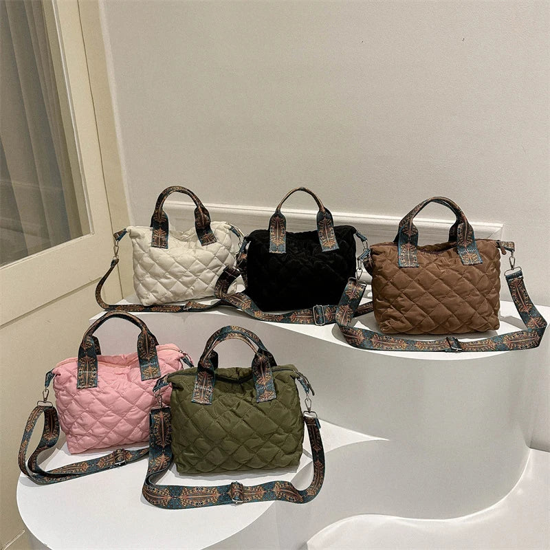 Elevate your style with these luxury designer shoulder crossbody bags for women. Featuring a quilted padded design from a top designer brand, these handbags are perfect for adding a touch of elegance to any outfit. -