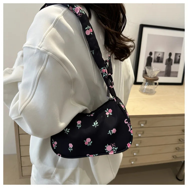 Stay stylish with these chic women's handbags made from nylon. Featuring a pleated design, these bags are perfect for the summer season, offering a trendy and functional accessory for your everyday outfits. -