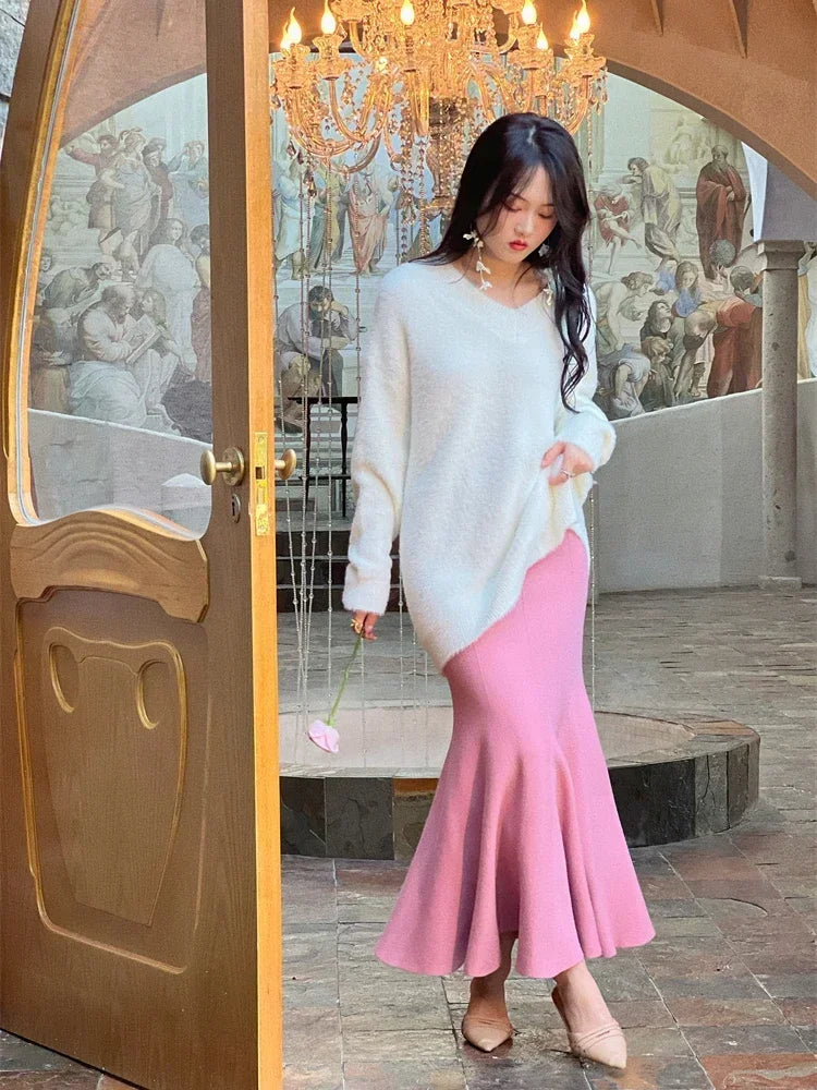 Stay cozy and chic with these fashionable women's long knitted skirts—perfect for stylish comfort all season! -