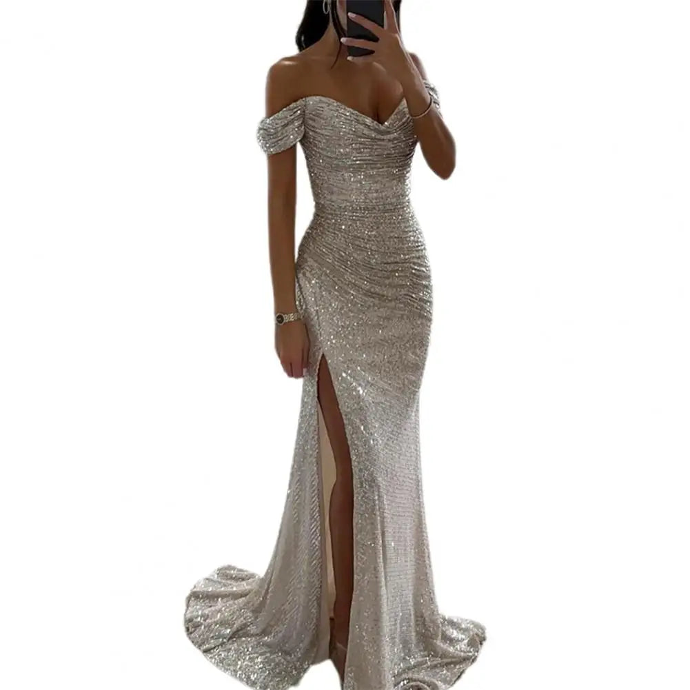 Dazzle in style with this sequin pleated maxi dress featuring short sleeves and a waist-tight silhouette—perfect for showcasing sophistication and glamour! -