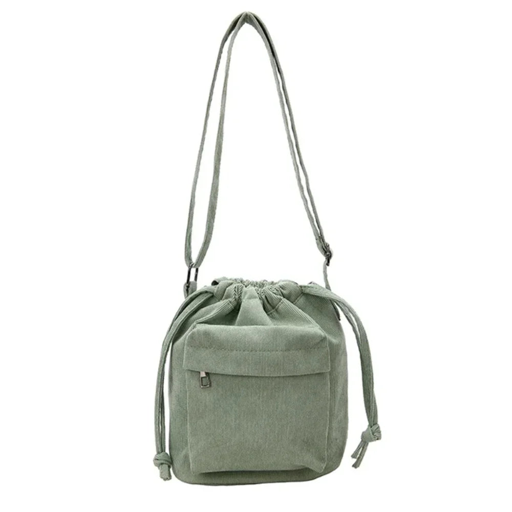 Carry your essentials in style with this cute middle shoulder drawstring bucket bag—a versatile and fashionable accessory for women on the go! -