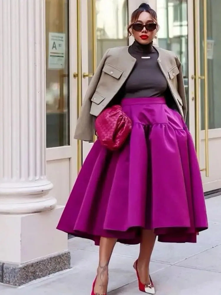 Combine elegance and practicality with these mid-calf satin women's skirts featuring handy pockets! -