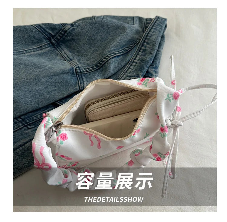 Stay stylish with these chic women's handbags made from nylon. Featuring a pleated design, these bags are perfect for the summer season, offering a trendy and functional accessory for your everyday outfits. -