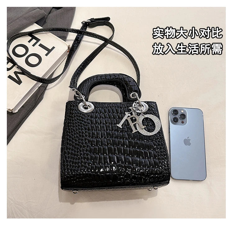 Make a style statement with this fashionable business tote bag designed for women. Featuring a touch of luxury, this bag is the perfect accessory to complement your professional look while adding a touch of elegance and sophistication. -