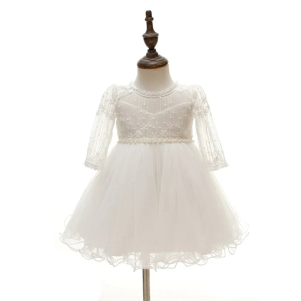 Make your baby girl shine in this elegant long-sleeve white party dress—perfect for special occasions! -