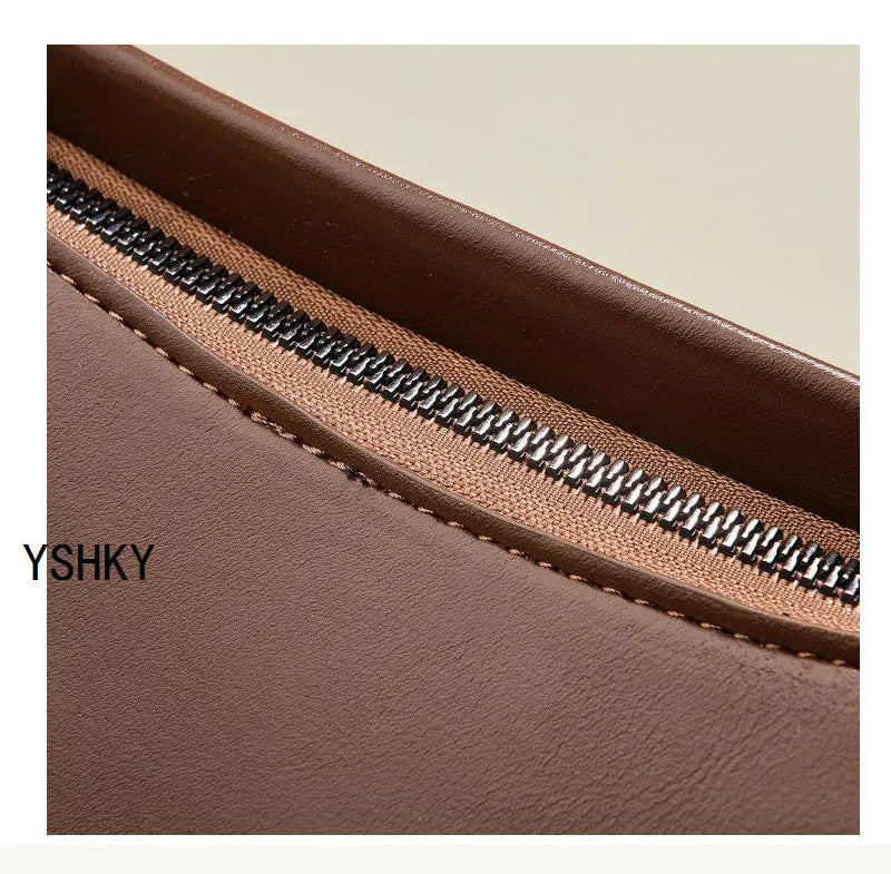 Elevate your style with this luxury designer crossbody bag for women, featuring a fashionable and chic color. Perfect for adding a touch of sophistication to your ensemble! -