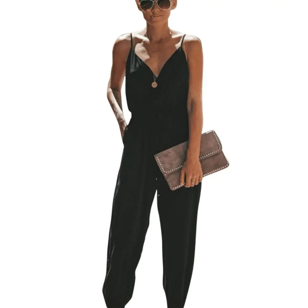 Dress to impress in this sexy and stylish women's summer jumpsuit. Featuring a backless design, deep V-neckline, floral print, and strappy details, this romper is perfect for making a statement with your outfit! -