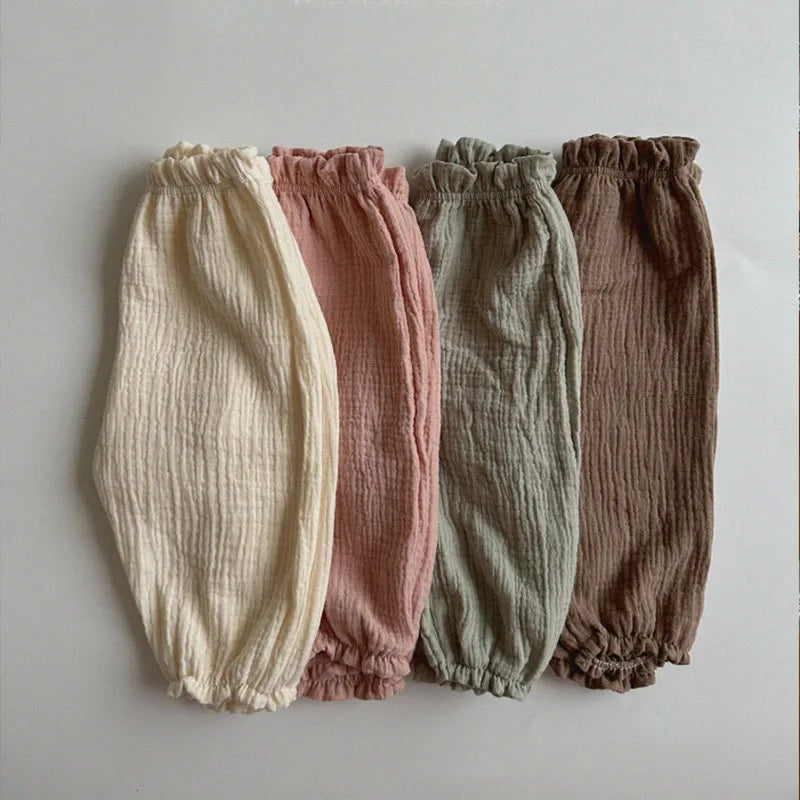 Keep your little ones comfy and cute in these organic cotton loose-fit baby pants—featuring playful tiger, bear, and floral prints perfect for boys and girls! -
