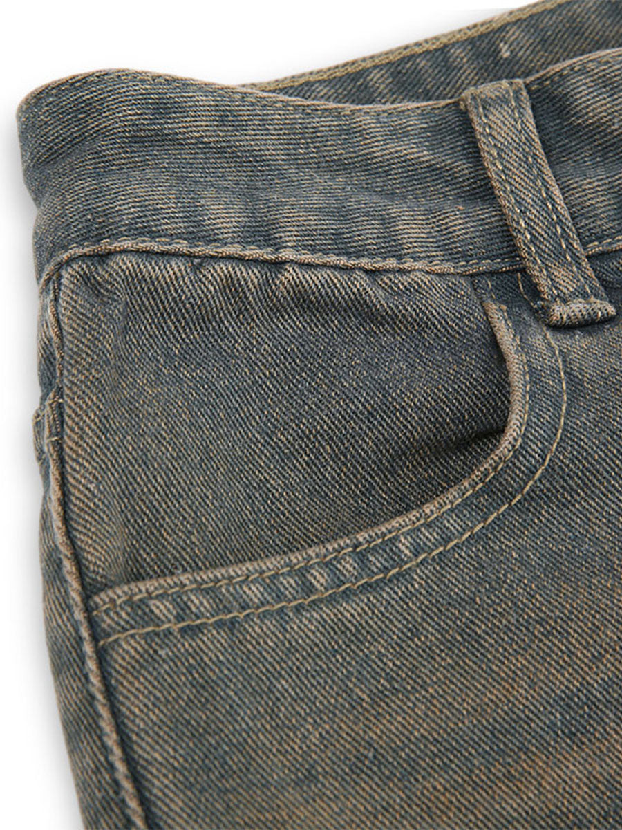 Rock the retro vibe with these baggy distressed low-rise vintage denim pants—loose, patched, and perfect for a cool mom style! -