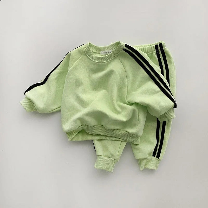 Keep your little one stylish and comfy with this cool two-piece baby suit—featuring a letter-printed zip-up top and matching leisure sports pants! -