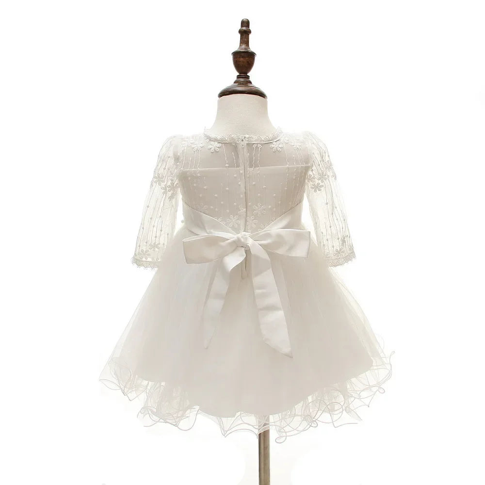 Make your baby girl shine in this elegant long-sleeve white party dress—perfect for special occasions! -