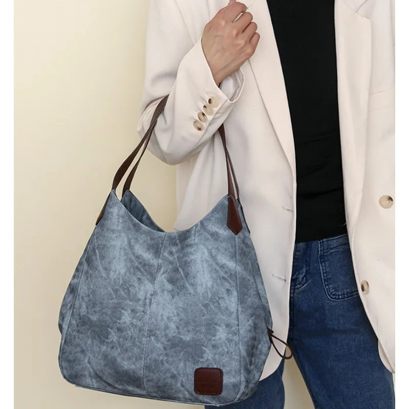 Stay organized and stylish with this large work tote bag for women. Designed with designer PU leather, this big bucket bag is perfect for carrying all your essentials in a chic and fashionable way. -