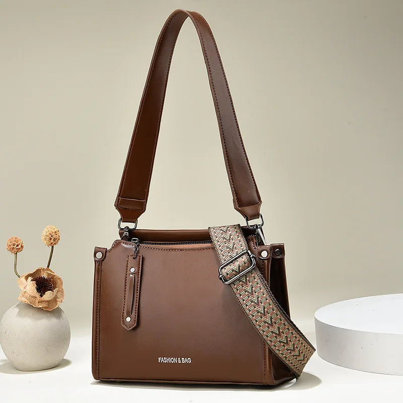 Elevate your style with this luxury designer crossbody bag for women, featuring a fashionable and chic color. Perfect for adding a touch of sophistication to your ensemble! -
